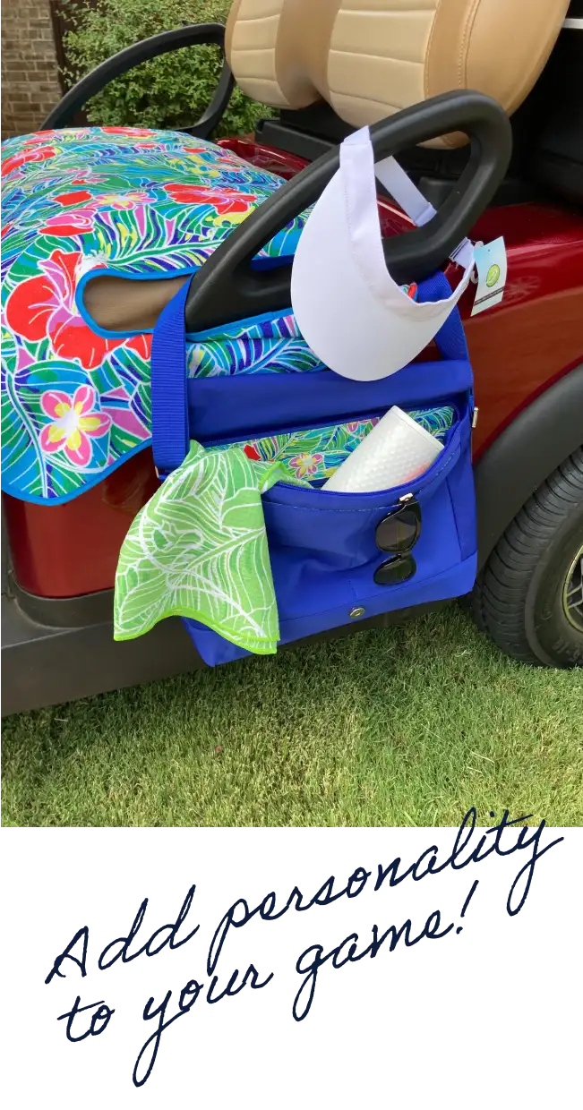 Blue golf cart side bag with tropical floral pattern and green towel hanging from it